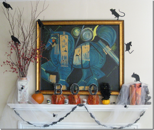 Halloween mantel decorating crows spiders boo sign