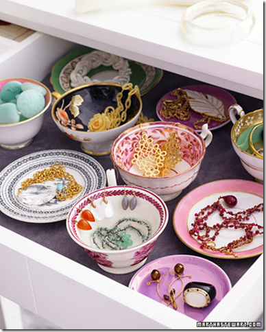 stylish drawer organizing china bowls cups