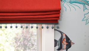 Red Roman Shade with Blue Pom Pom Trim