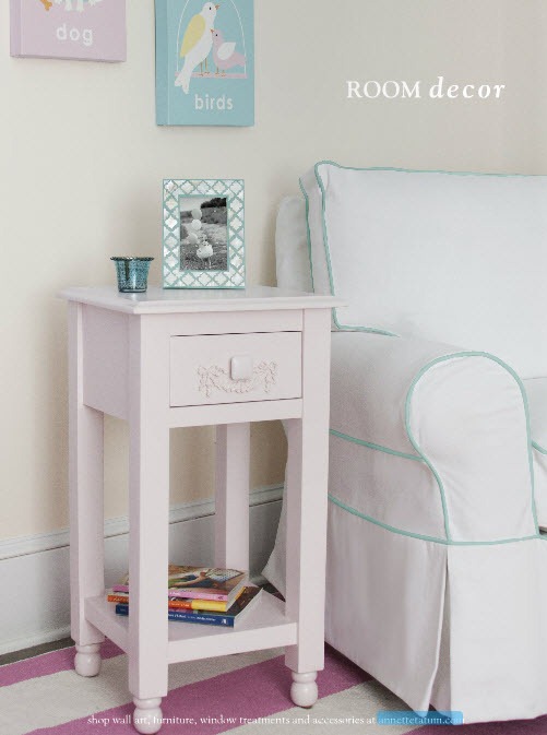 Tailored upholstery nursery glider in white