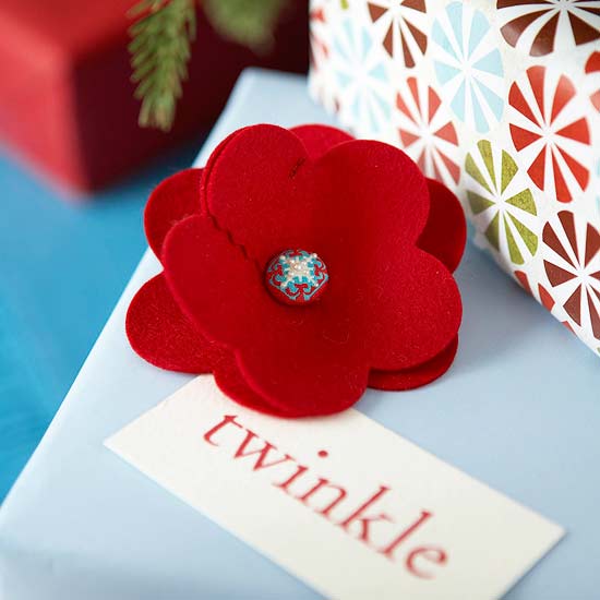 holiday gift with red felt flower
