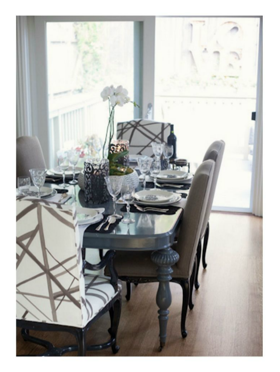dining room with kelly wearstler chairs