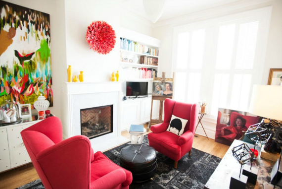 red chairs by fireplace