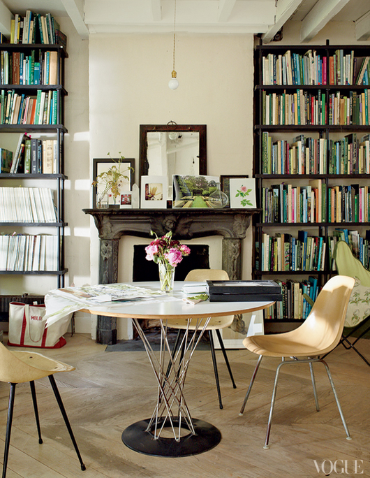 eclectic home office with bookshelves