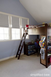 traditional boy's bedroom with high ceiling