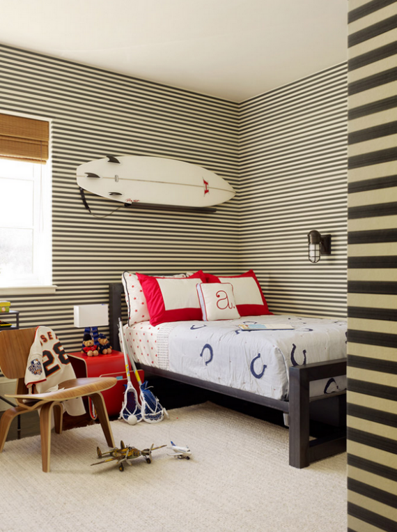 designer boys bedroom with surfboard