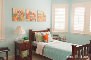 traditional boys bedroom in blue and orange