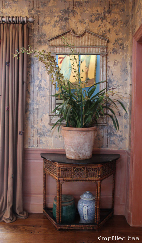 chinoiserie chic foyer with bamboo wallpaper