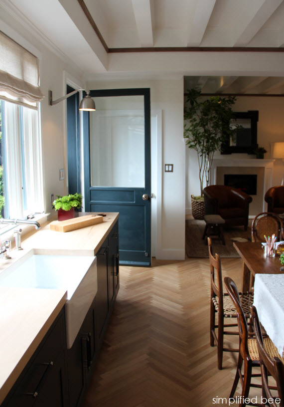 farn house kitchen sink + herringbone wood floors + kitchen door