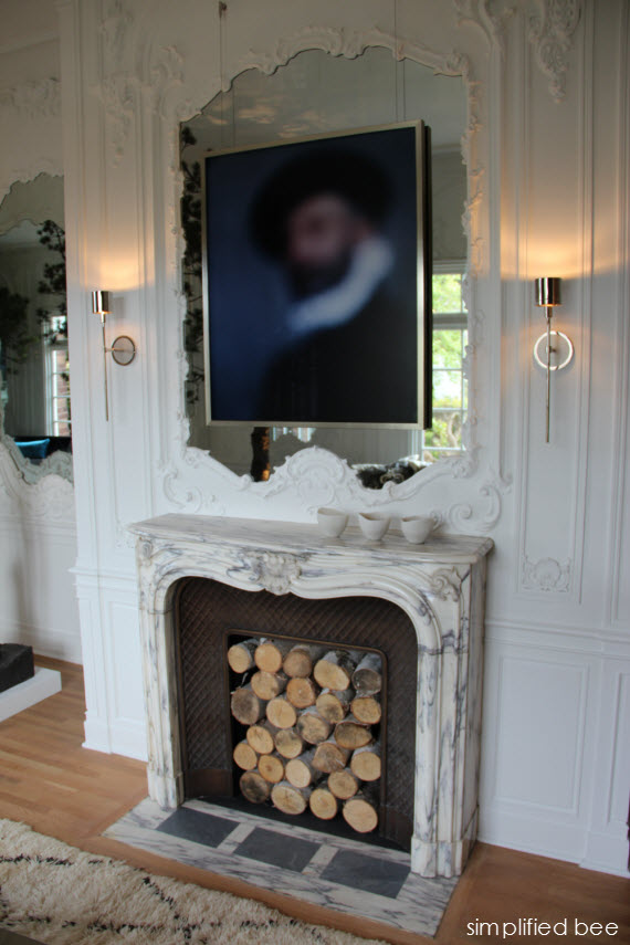 marble fireplace with mirror and artwork - San Francisco Decorator Showcase