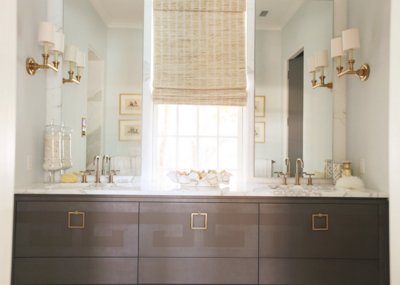 contemporary bathroom with brass fixtures, hardware and accents