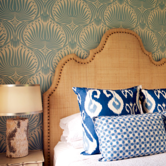 elegant bedroom with blue wallpaper