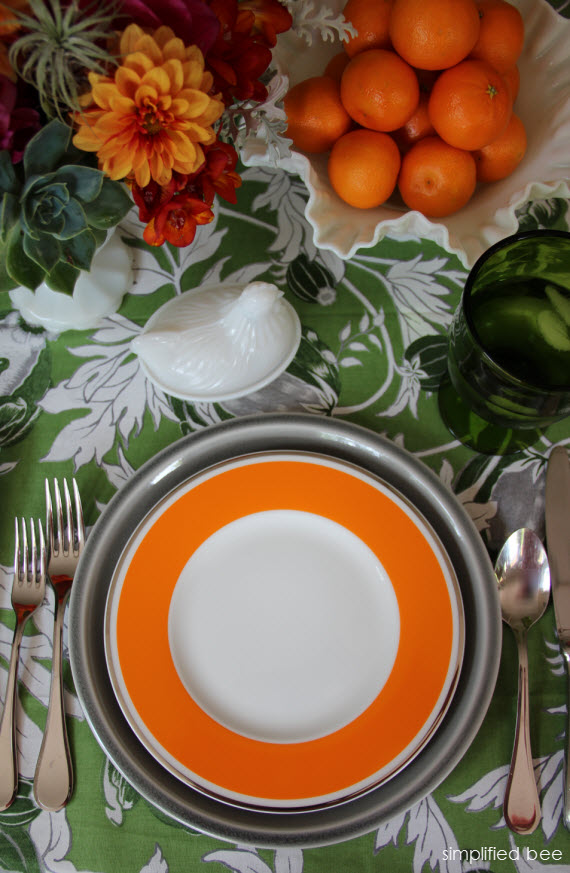 orange dinnerware tablescape - Simplified Bee