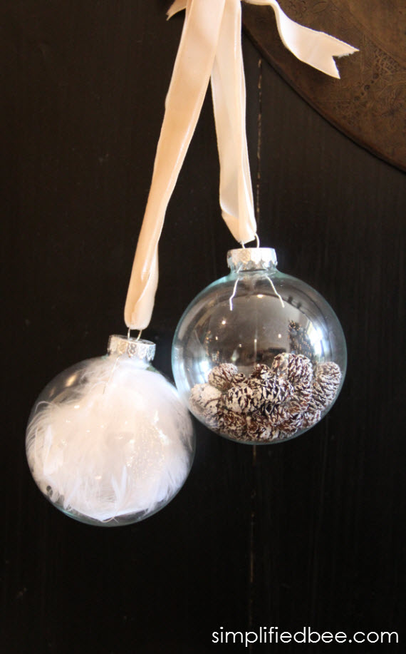 DIY globe ornaments with feathers and pine cones - simplified bee
