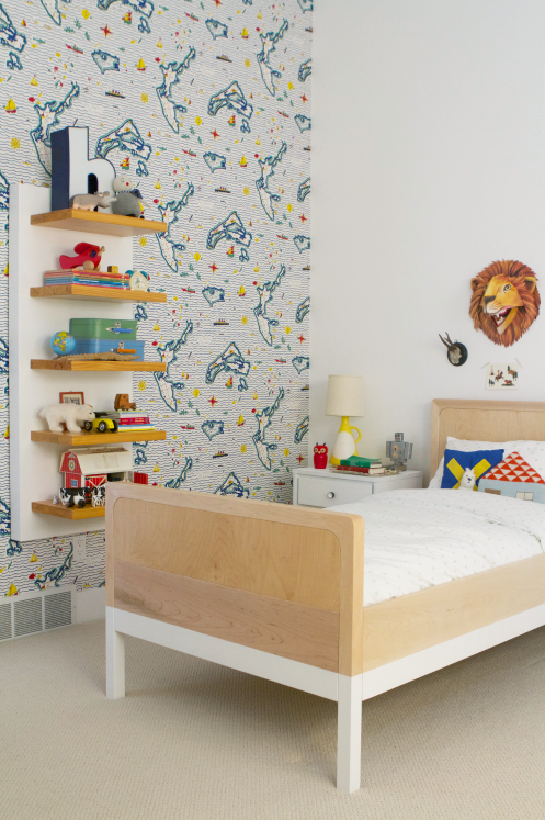 boy's toddler bedroom with map wallpaper