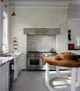 white gourmet kitchen with sub-zero wolf range