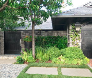 california home with stone fence #curbappeal