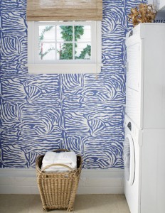 laundry room with blue and white wallpaper