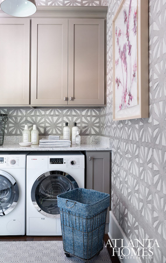 laundry room with gray wallpaper