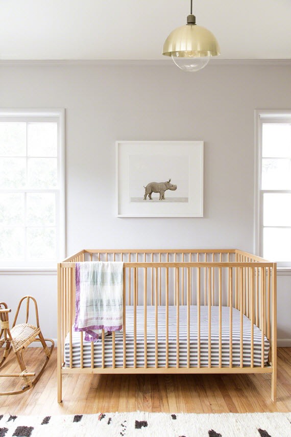 nursery design // baby rhino artwork // ikea crib